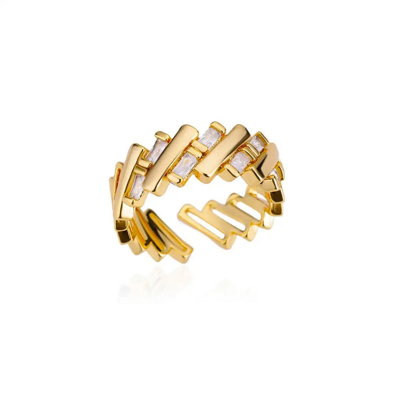 ANILLO AJUSTABLE CIRCONITAS CON TACHUELAS BAÑADAS EN ORO 18K - AN126