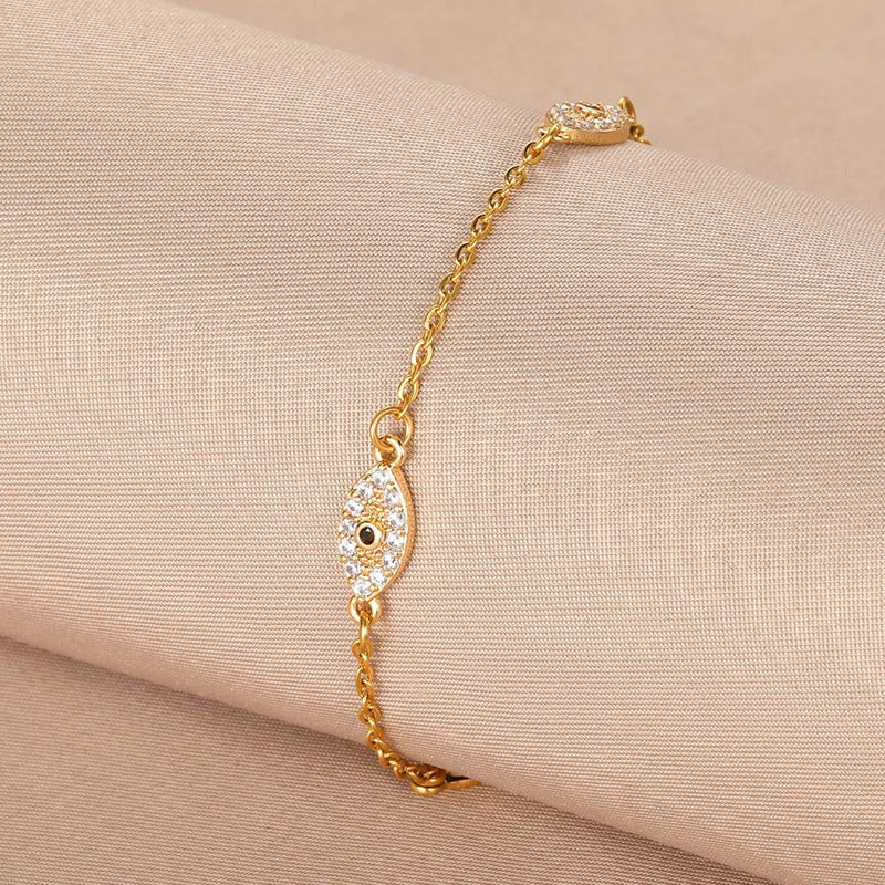 PULSERA OJO GRIEGO CON TACHUELAS CHAPADAS EN ORO 18K - PLS 133
