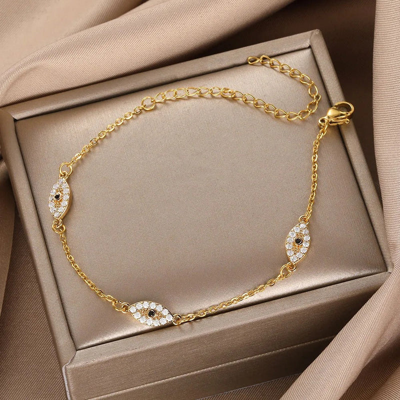 PULSERA OJO GRIEGO CON TACHUELAS CHAPADAS EN ORO 18K - PLS 133