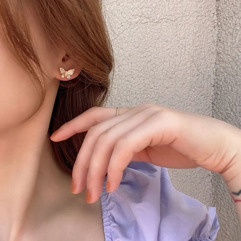 AROS CON MARIPOSAS TACHONADAS EN BAÑO DE ORO 18K - BR212