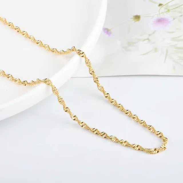 CADENA RETORCIDA DE 45CM CHAPADA EN ORO 18K - COR299