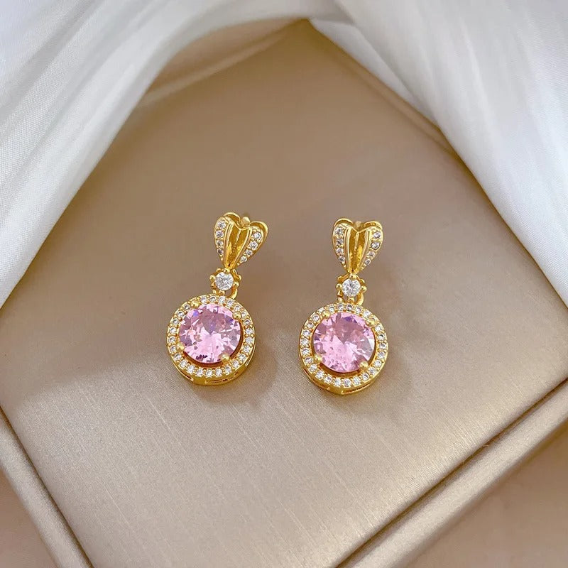 CONJUNTO DE CRISTALES ROSAS BAÑADO EN ORO 18K - CONJ180