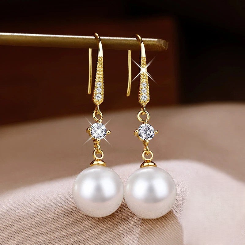 AROS DE PERLAS CON TACHUELAS BAÑADAS EN ORO 18K - BRSI269