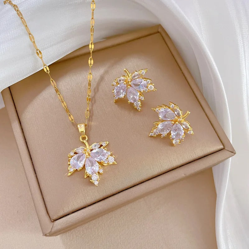 CONJUNTO HOJA DE ARCE CANADÁ BAÑADO EN ORO EN 18K - CONJ342