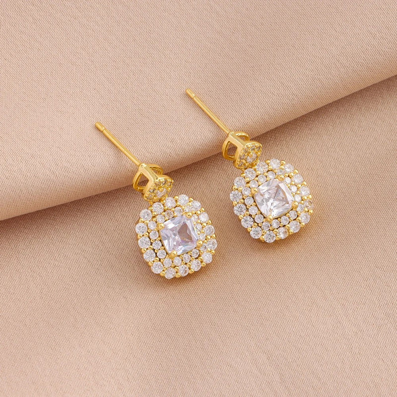 CONJUNTO DE CRISTALES BAÑADO EN ORO 18K - CONJ137