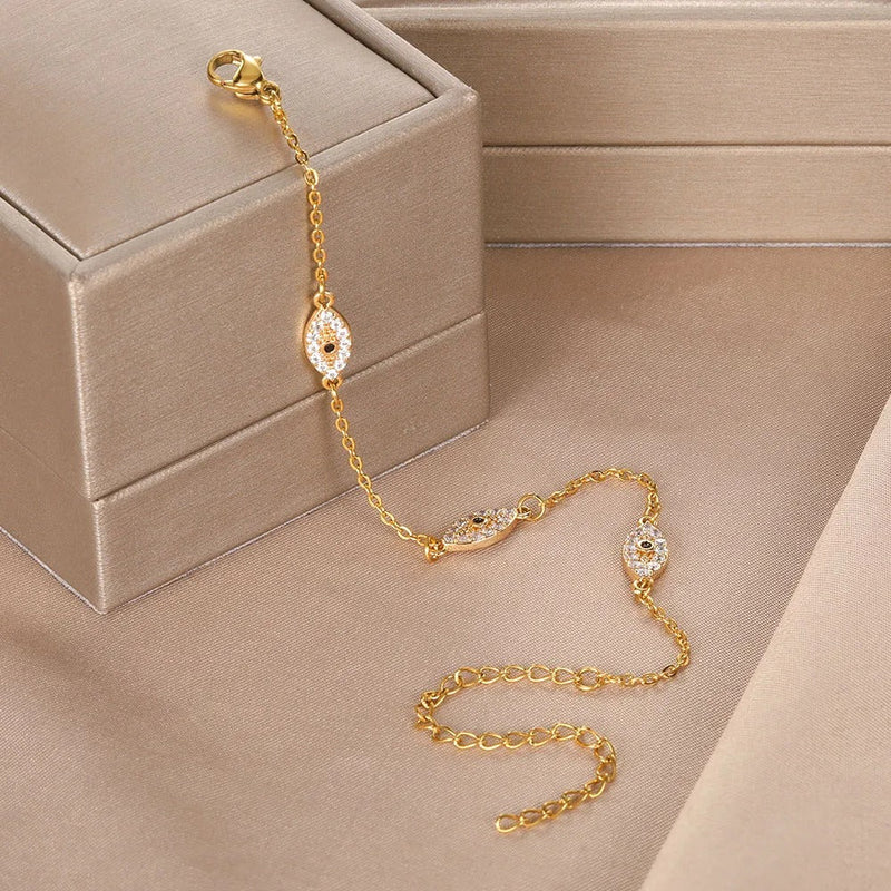PULSERA OJO GRIEGO CON TACHUELAS CHAPADAS EN ORO 18K - PLS 133