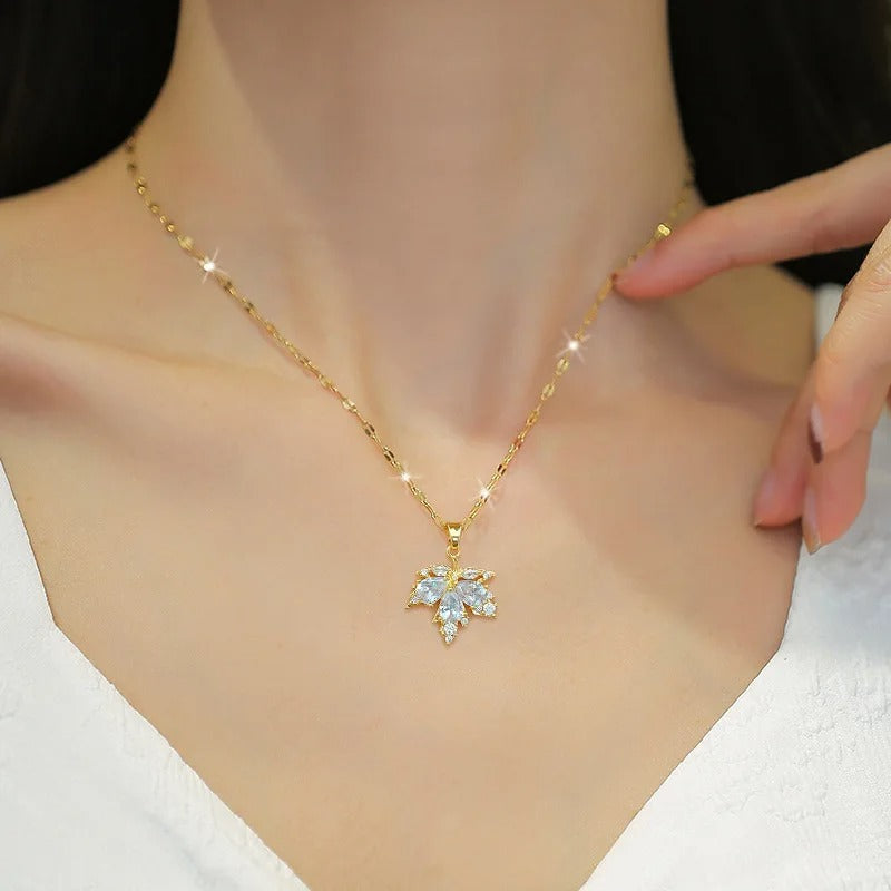 CONJUNTO HOJA DE ARCE CANADÁ BAÑADO EN ORO EN 18K - CONJ342