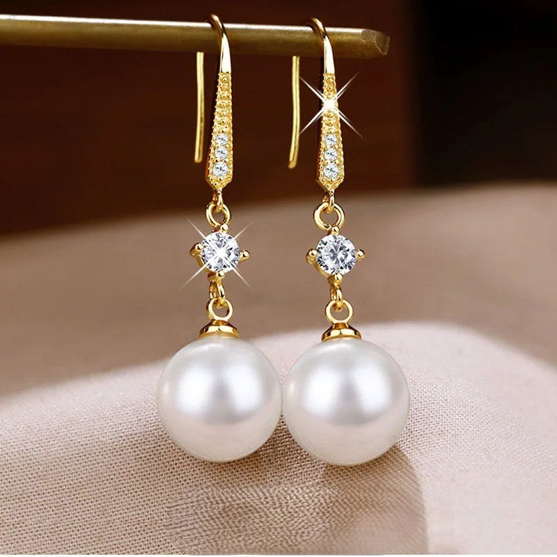AROS DE PERLAS CON TACHUELAS BAÑADAS EN ORO 18K - BRSI269