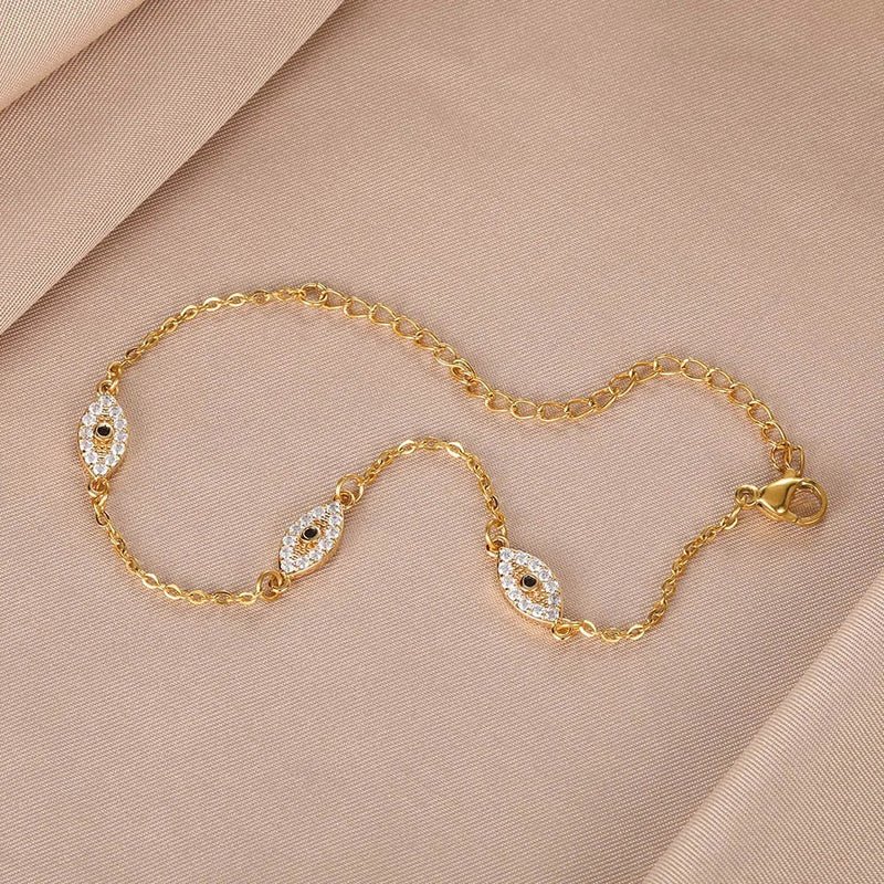 PULSERA OJO GRIEGO CON TACHUELAS CHAPADAS EN ORO 18K - PLS 133